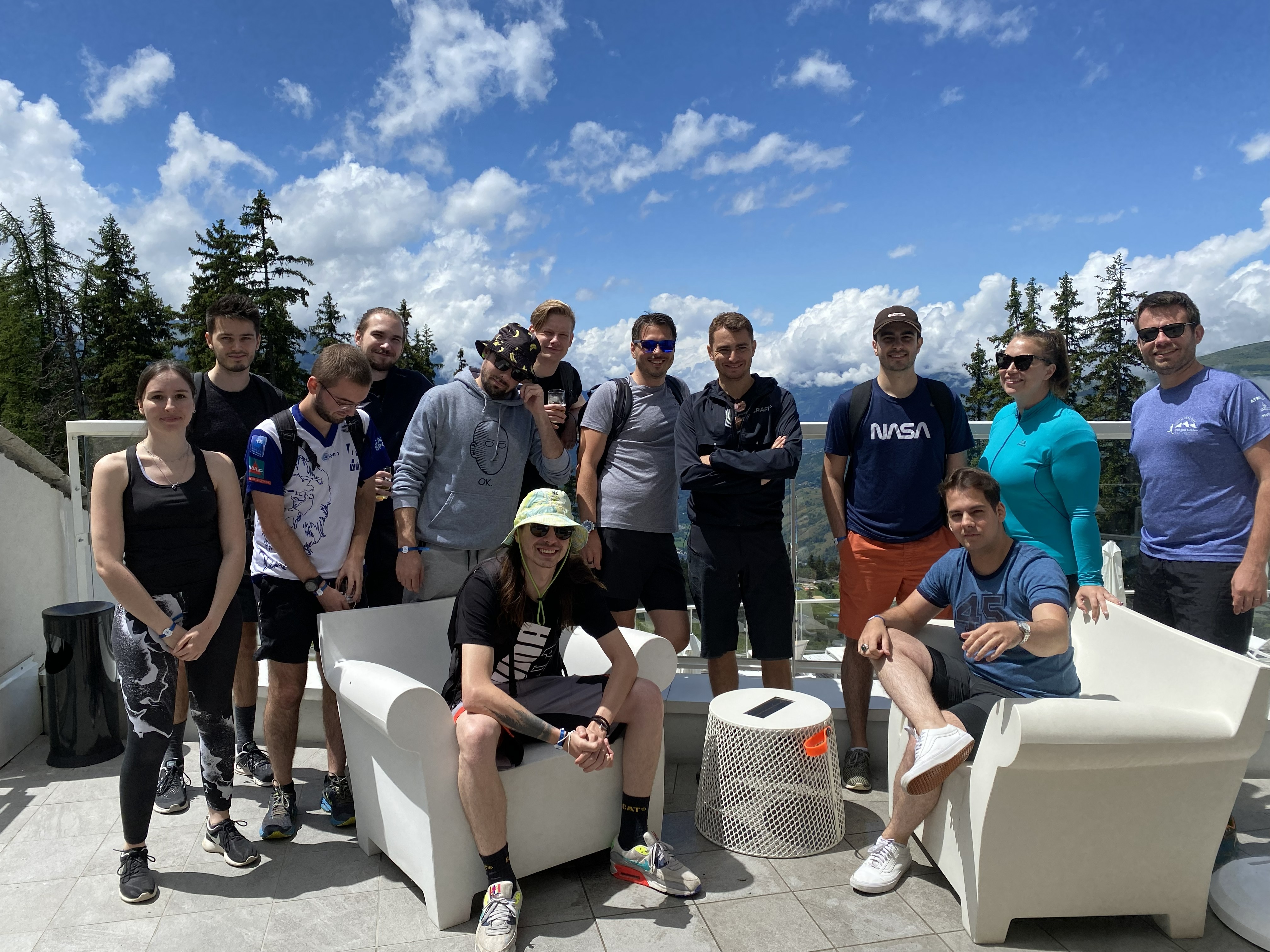 The 8SEC team together on a mountain terrace at a team off-site